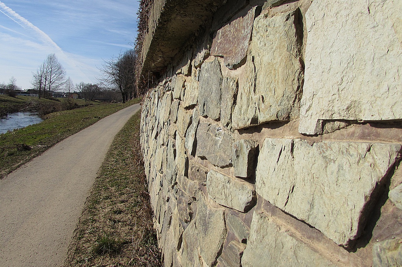 stone wall fixing sidewalk free photo