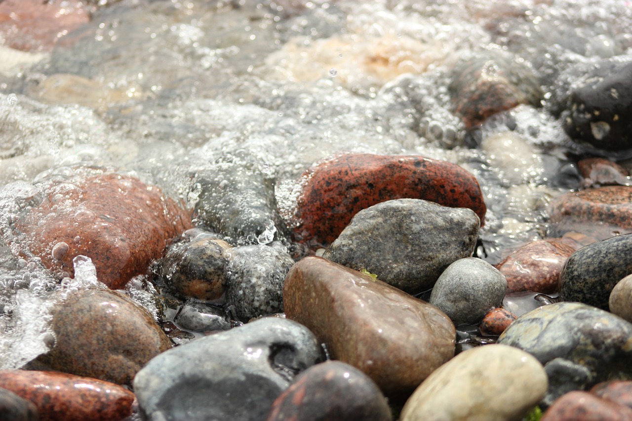 stones beach sand free photo
