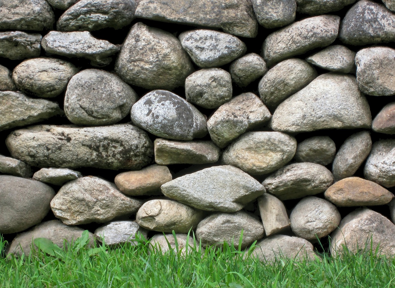 stones grass wall free photo