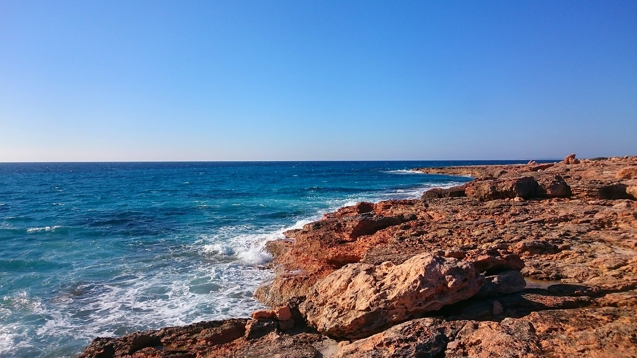 stones beach sea free photo