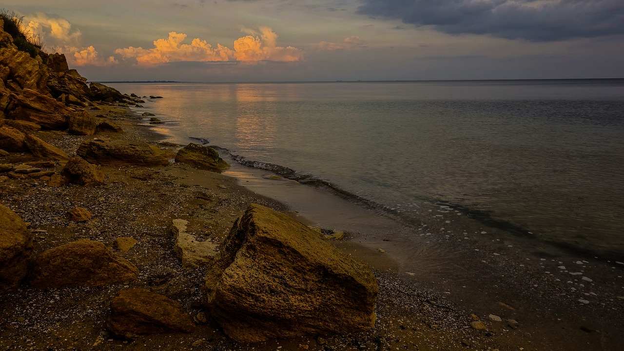 stones sea clouds free photo