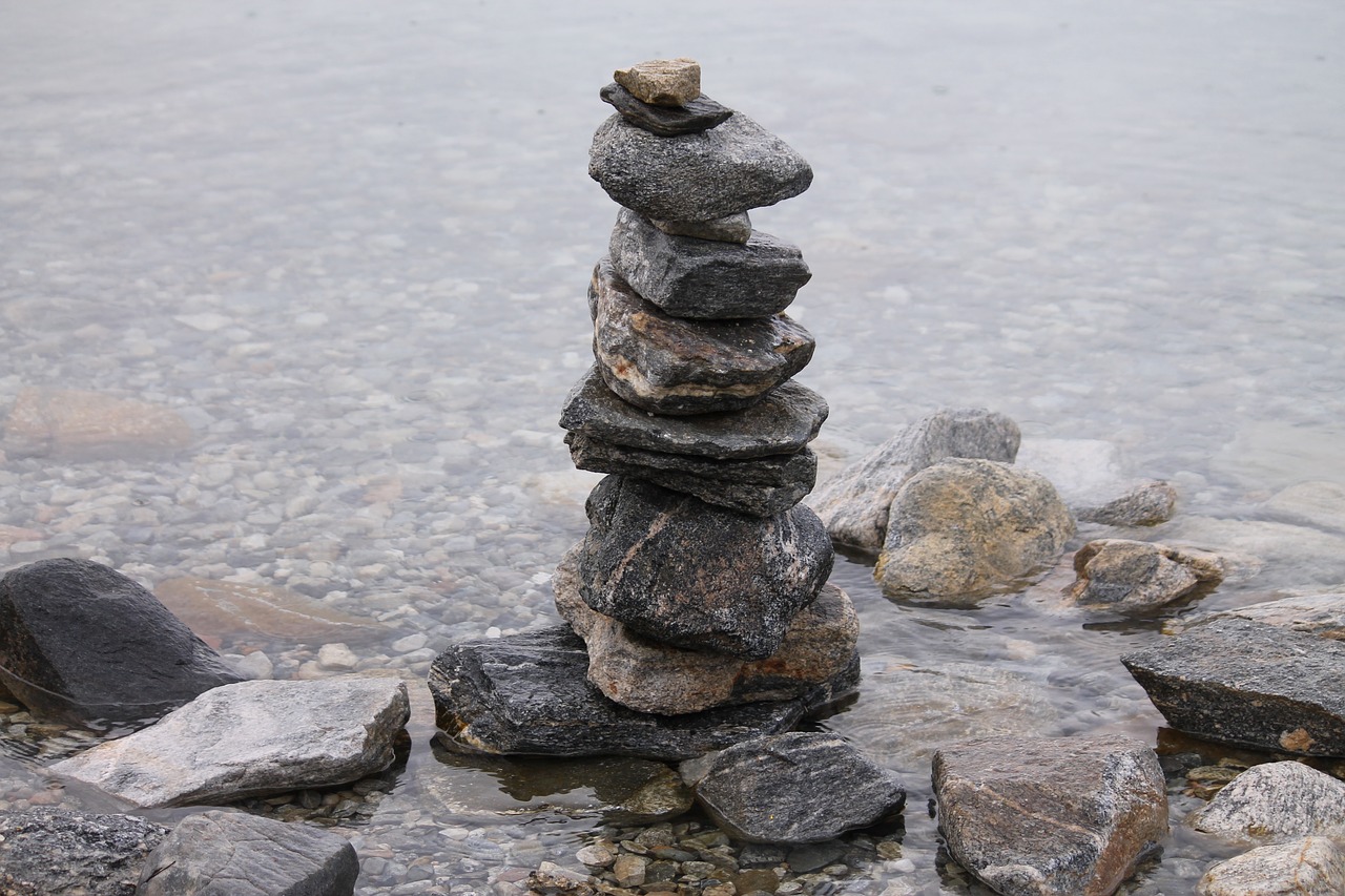 stones stone stack stone and water free photo