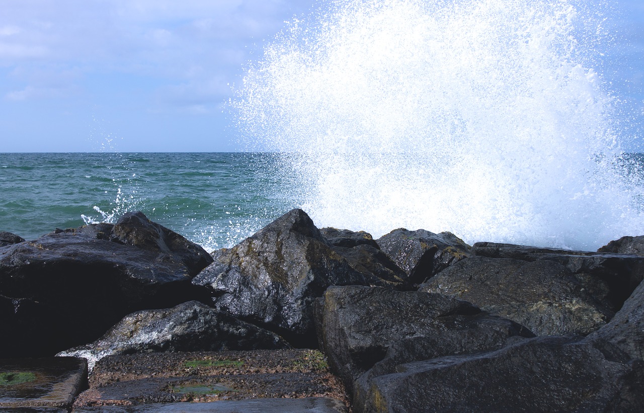 stones north sea wave free photo