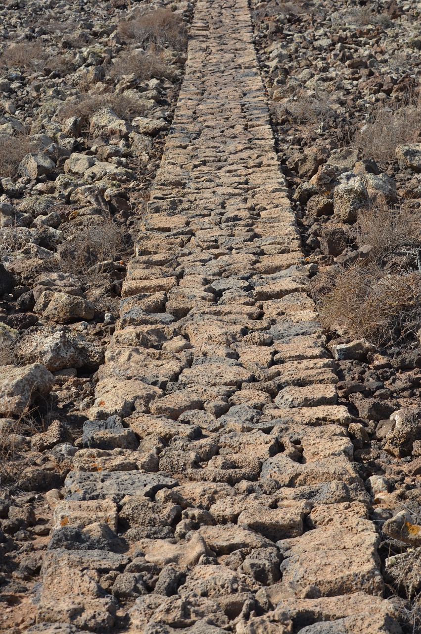 stones walking path road free photo