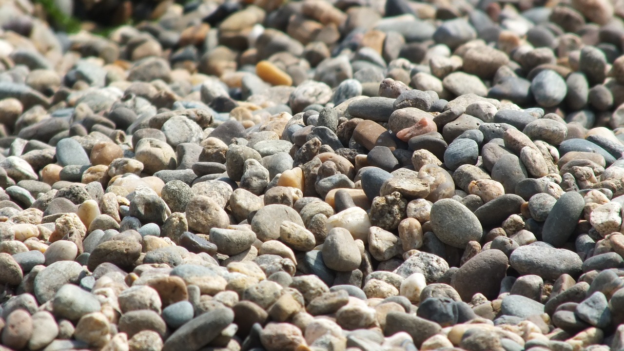 stones pebbles sea free photo