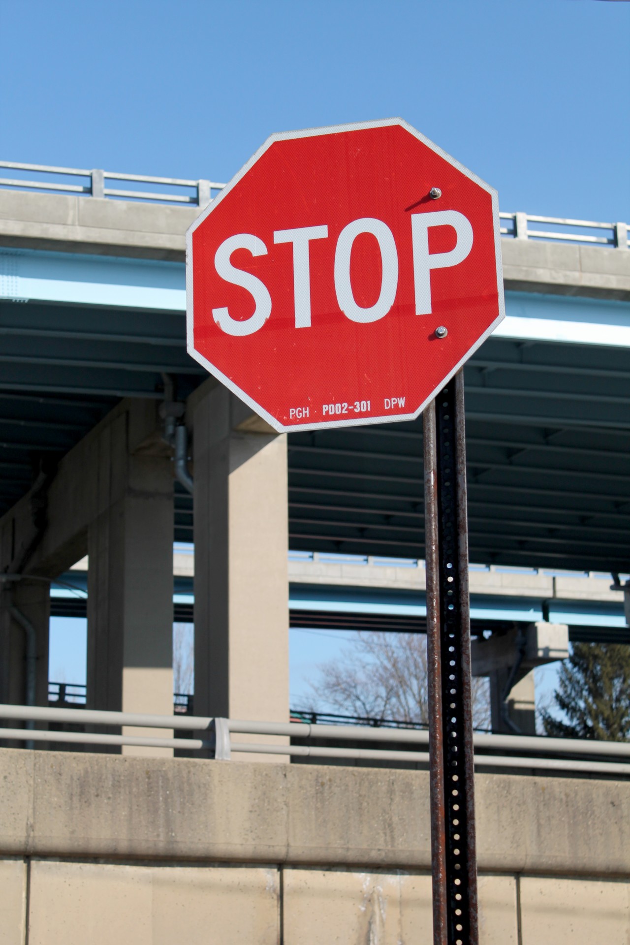 stop sign overpass street free photo