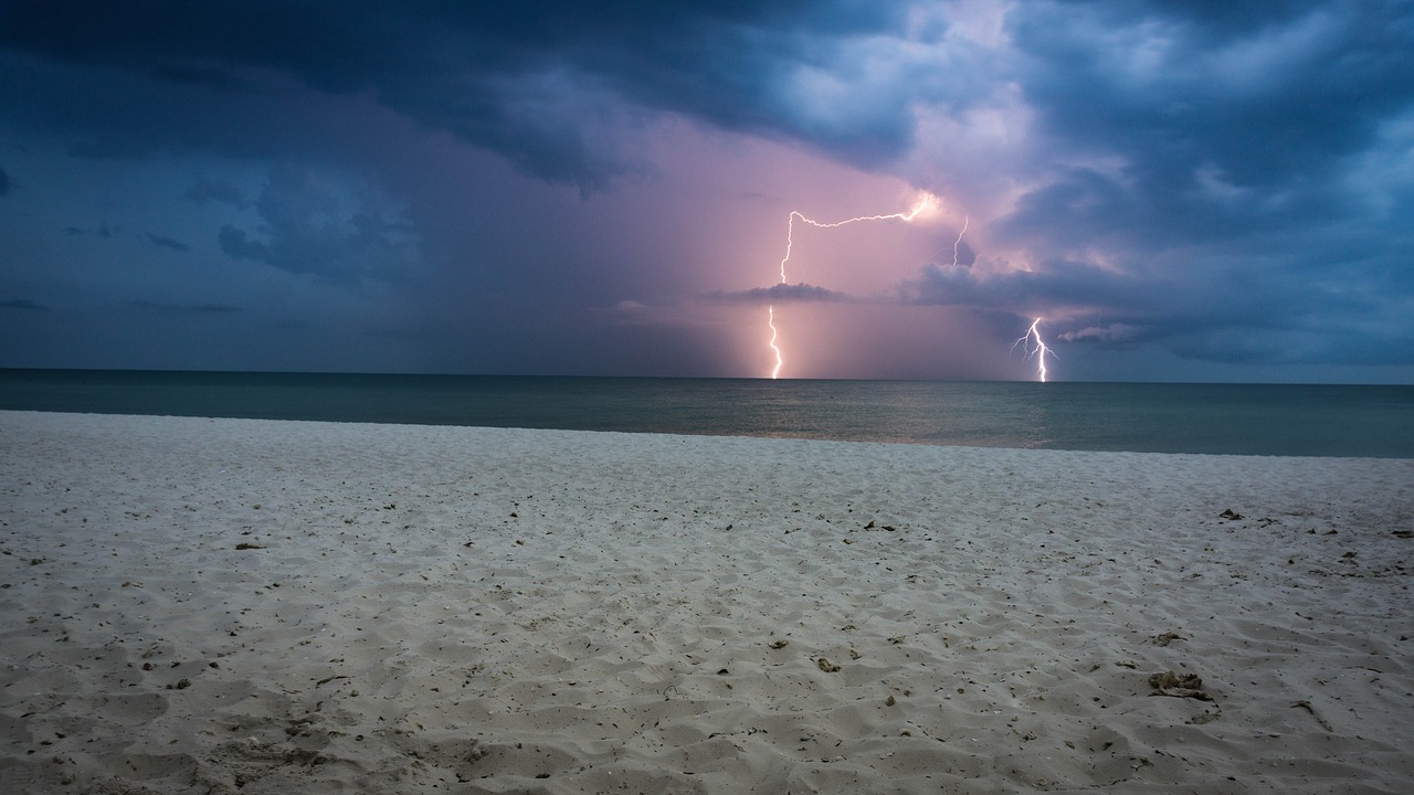 storm lightning sea free photo