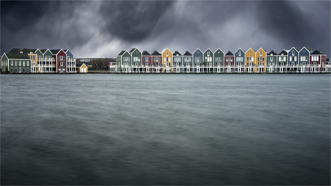 storm  cottages wooden  netherlands free photo