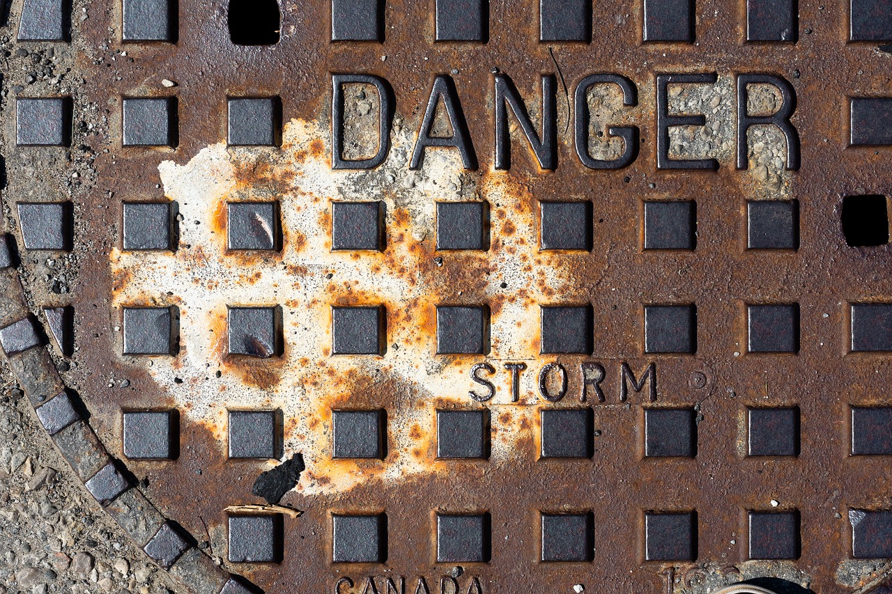 storm drain cover  urban  texture free photo