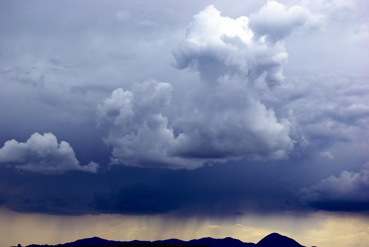 stormy sky over sleeping ute  dark  clouds free photo