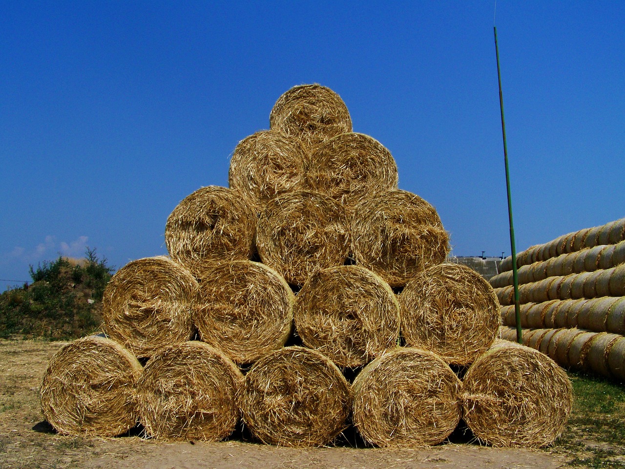 straw bales pyramid summer free photo