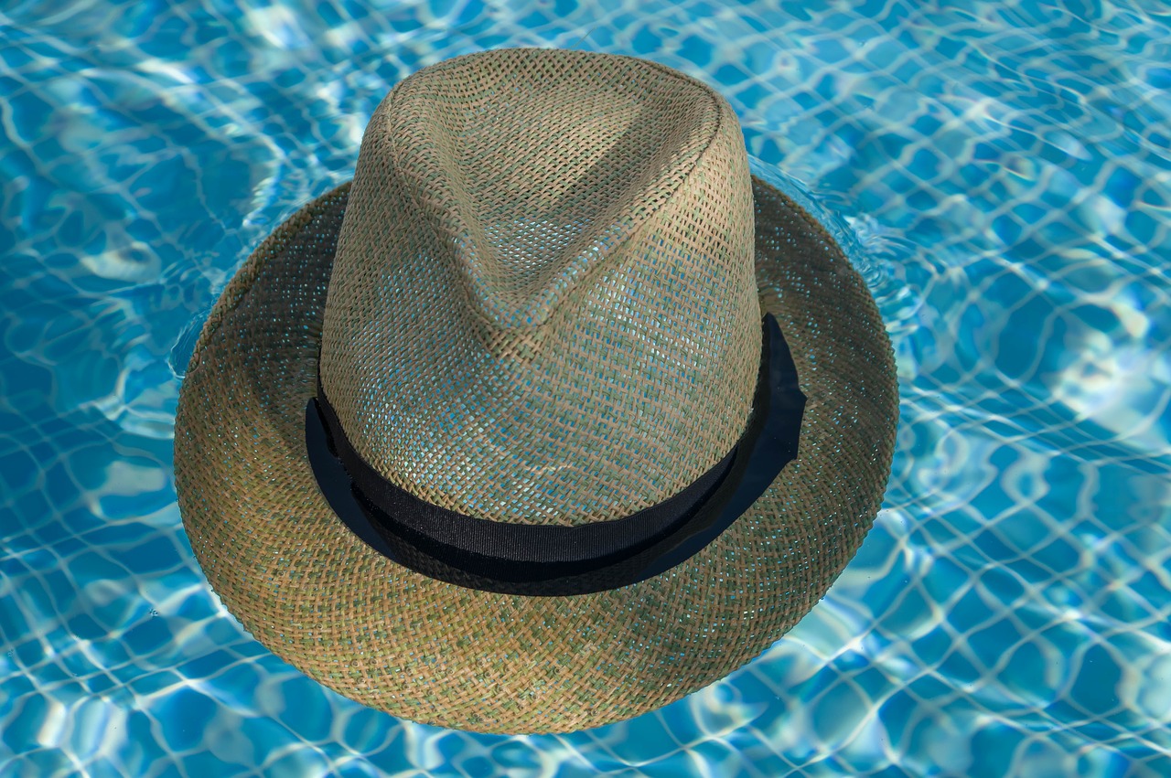 straw hat  swimming pool  holiday free photo