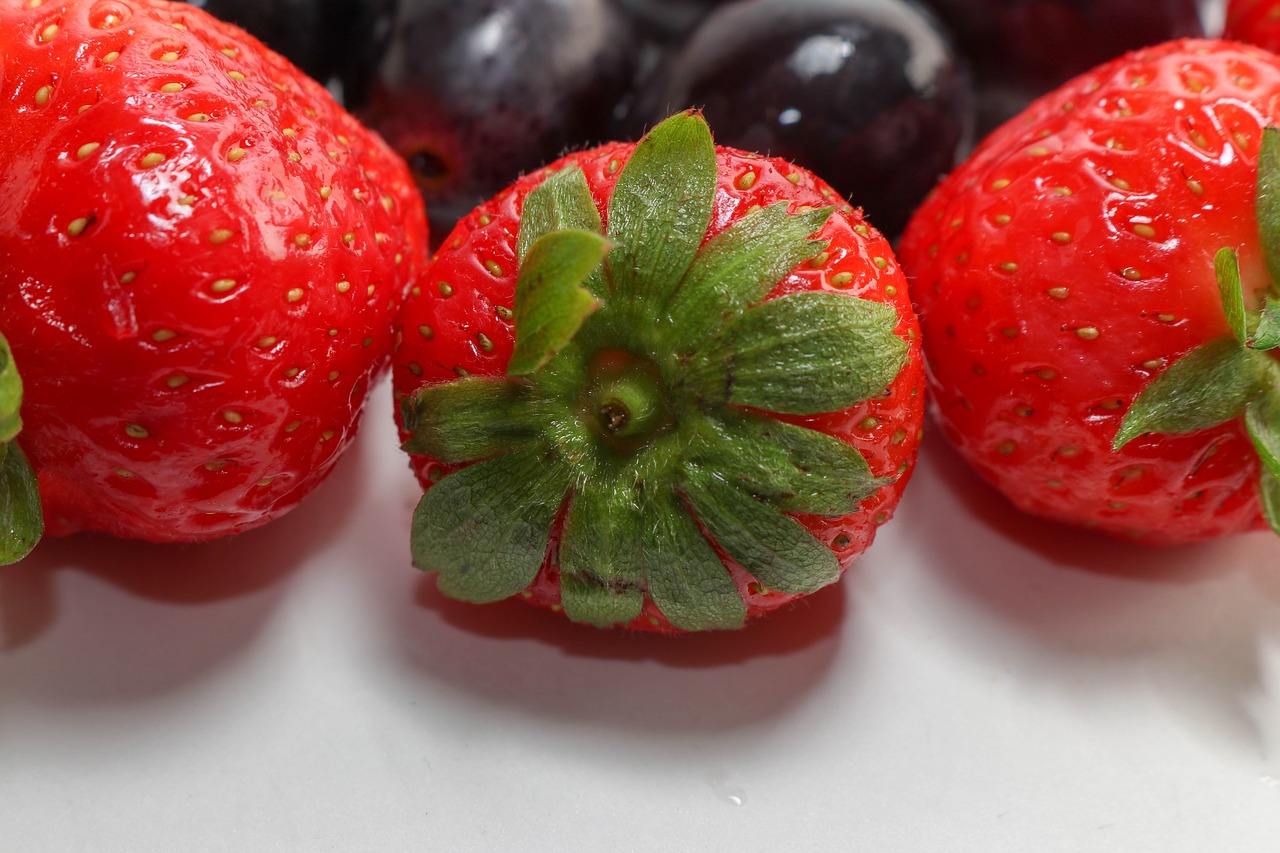 strawberries  grapes  pineapple free photo