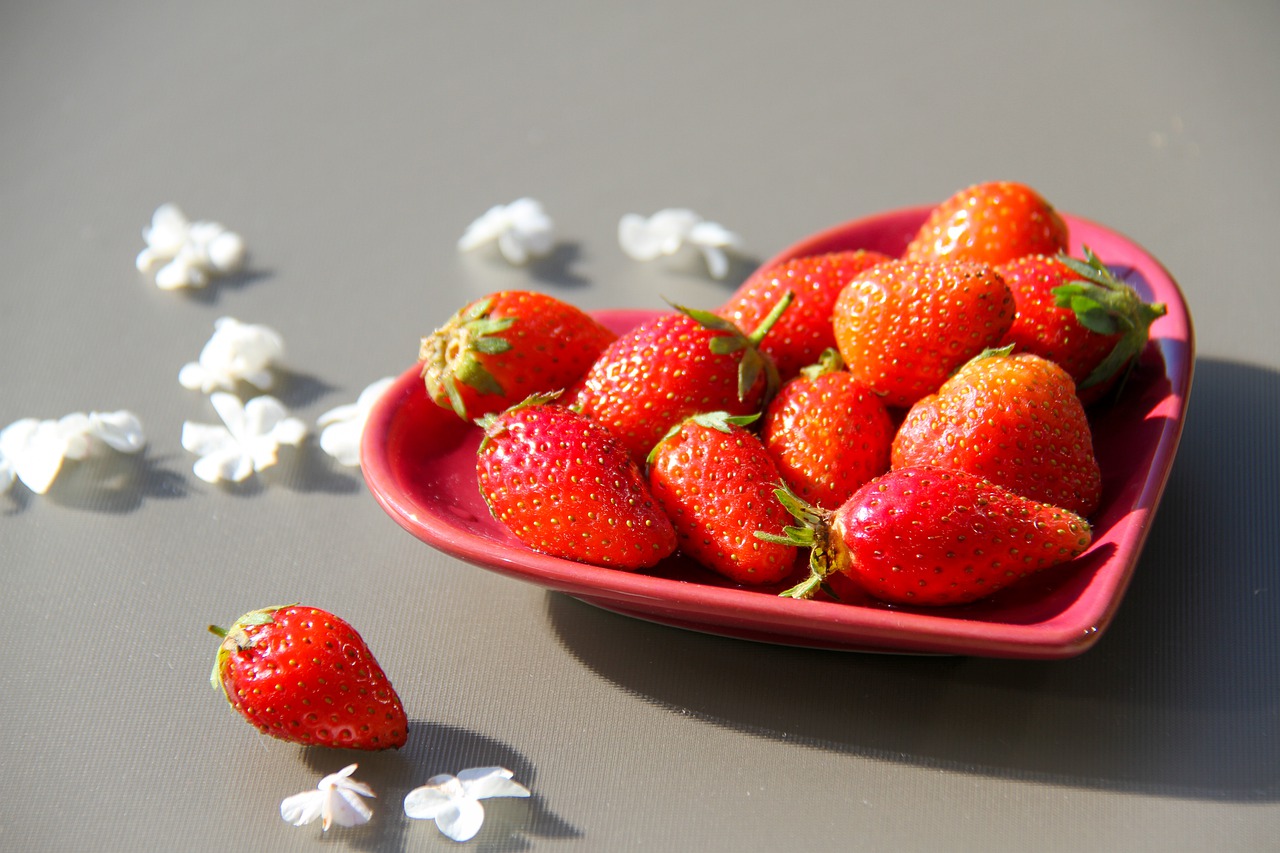 strawberries  saucer  sun free photo