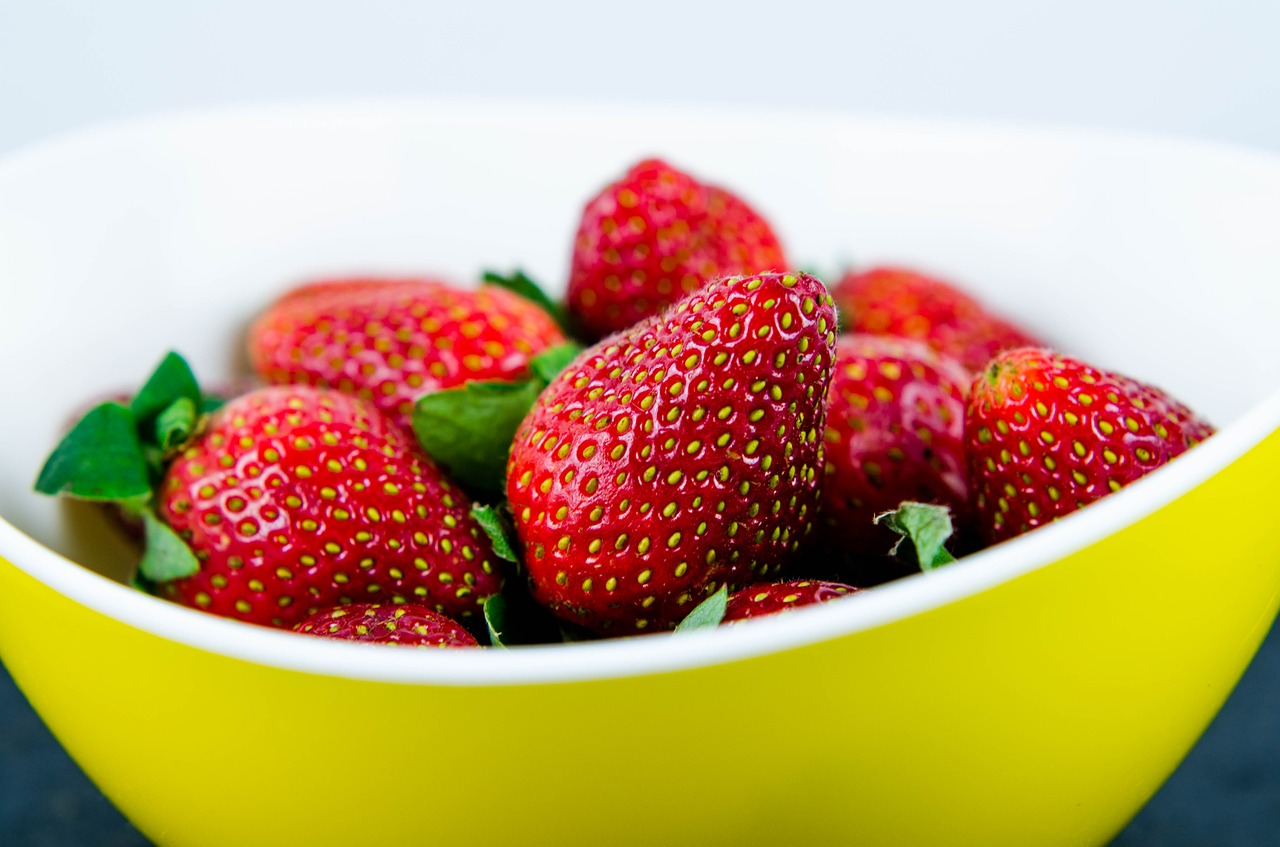 strawberry in yellow bowl strawberries free photo