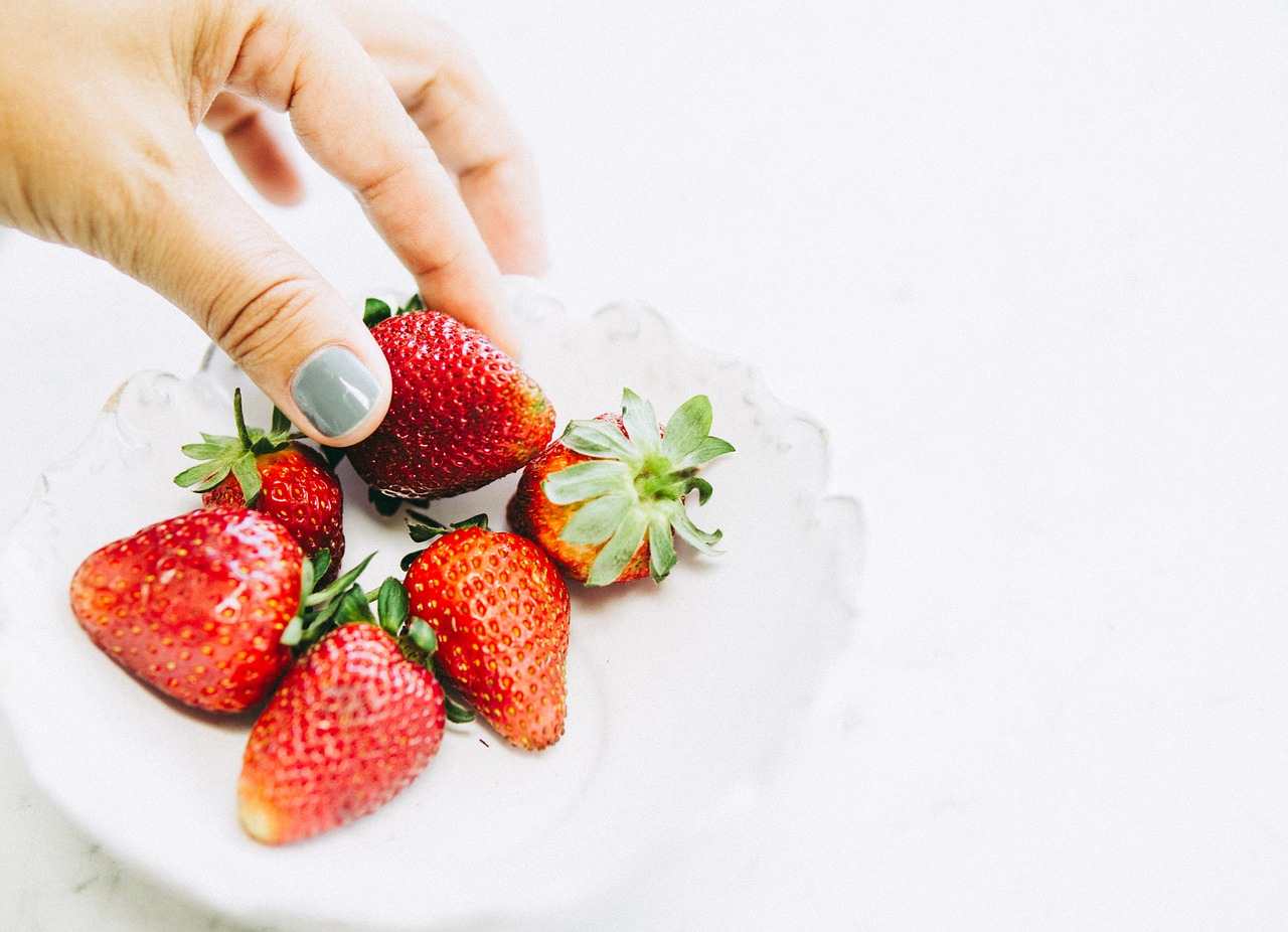 strawberry  hand  healthy free photo