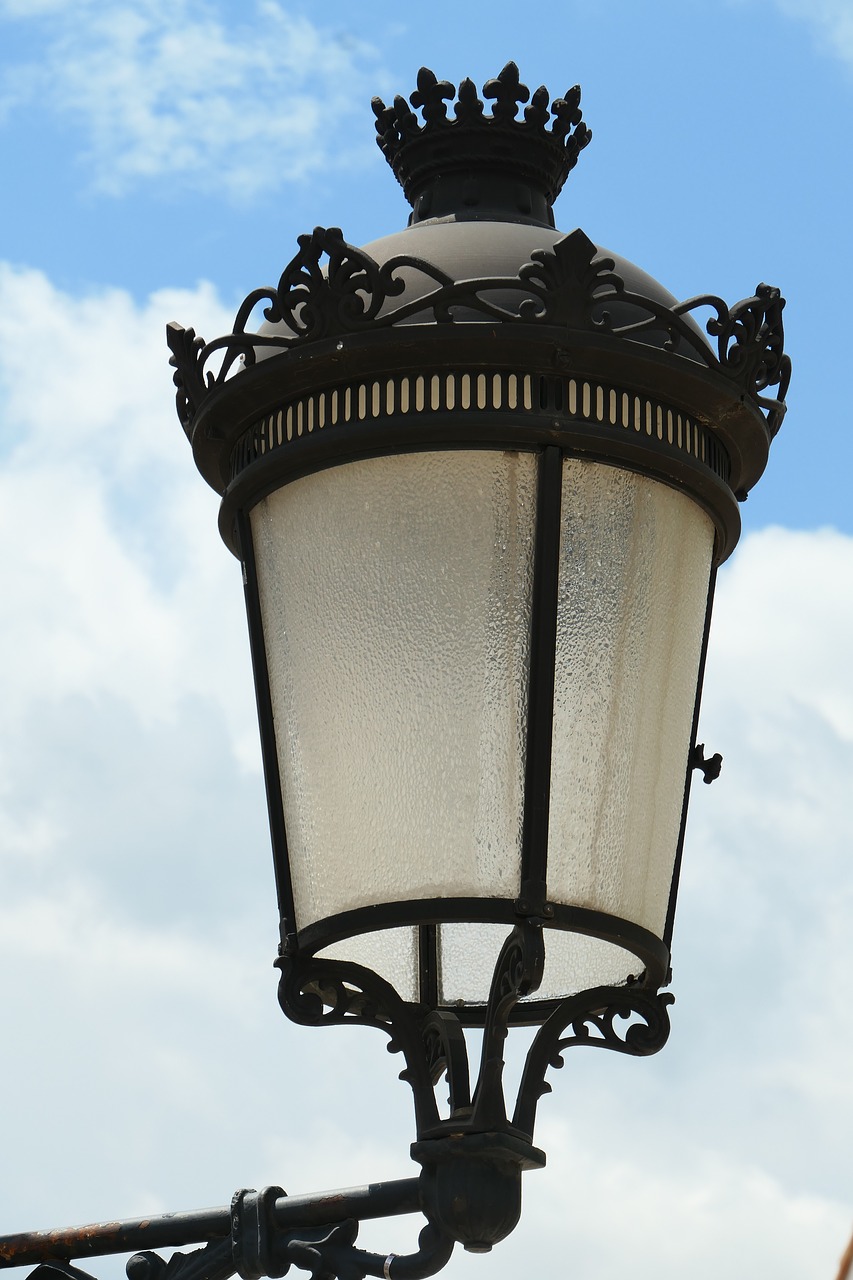 street lamp  sky  clouds free photo