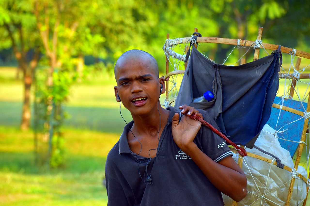 street vendor papadum seller young man free photo