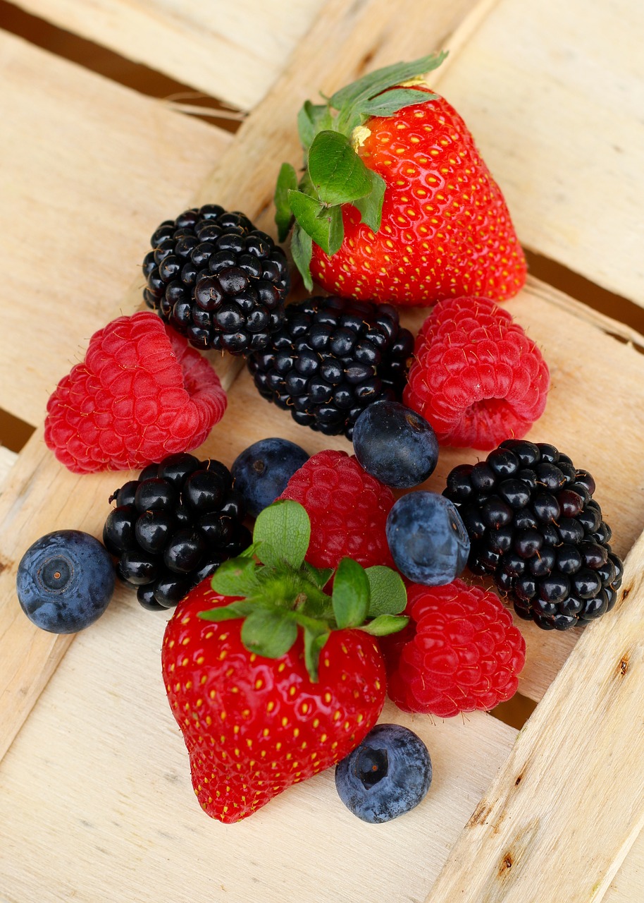 summer fruits strawberry raspberry free photo