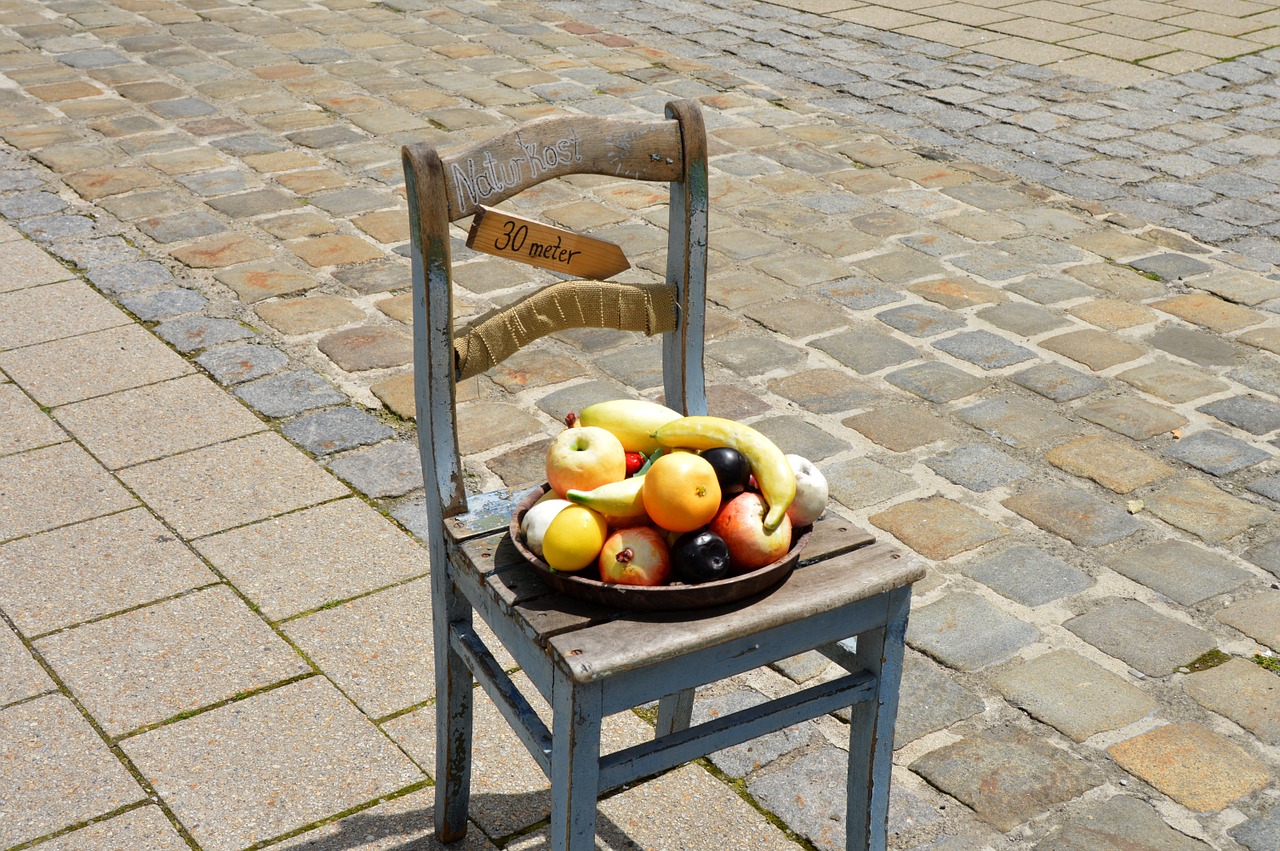 summer health food on chair with paving stones free photo