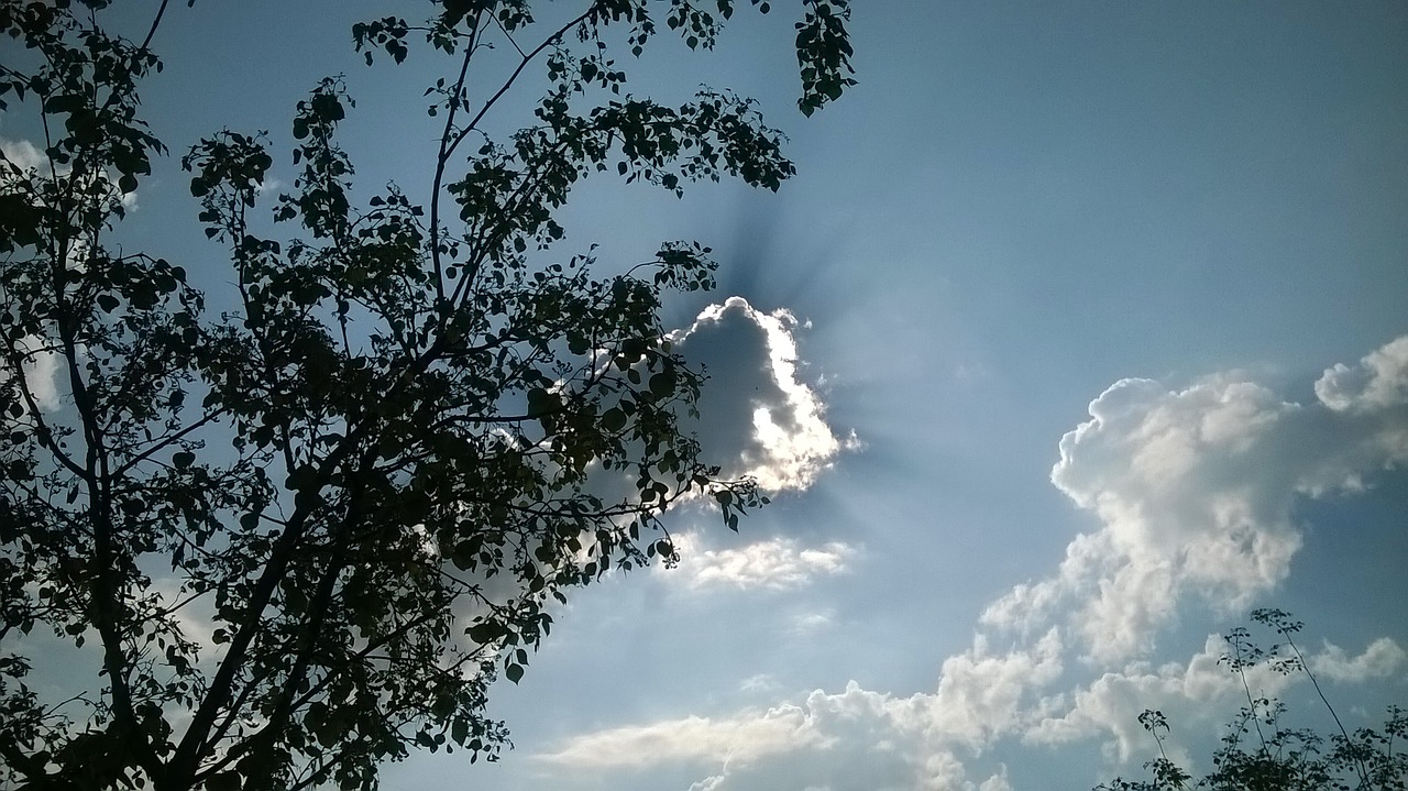 sun hiding cloud free photo