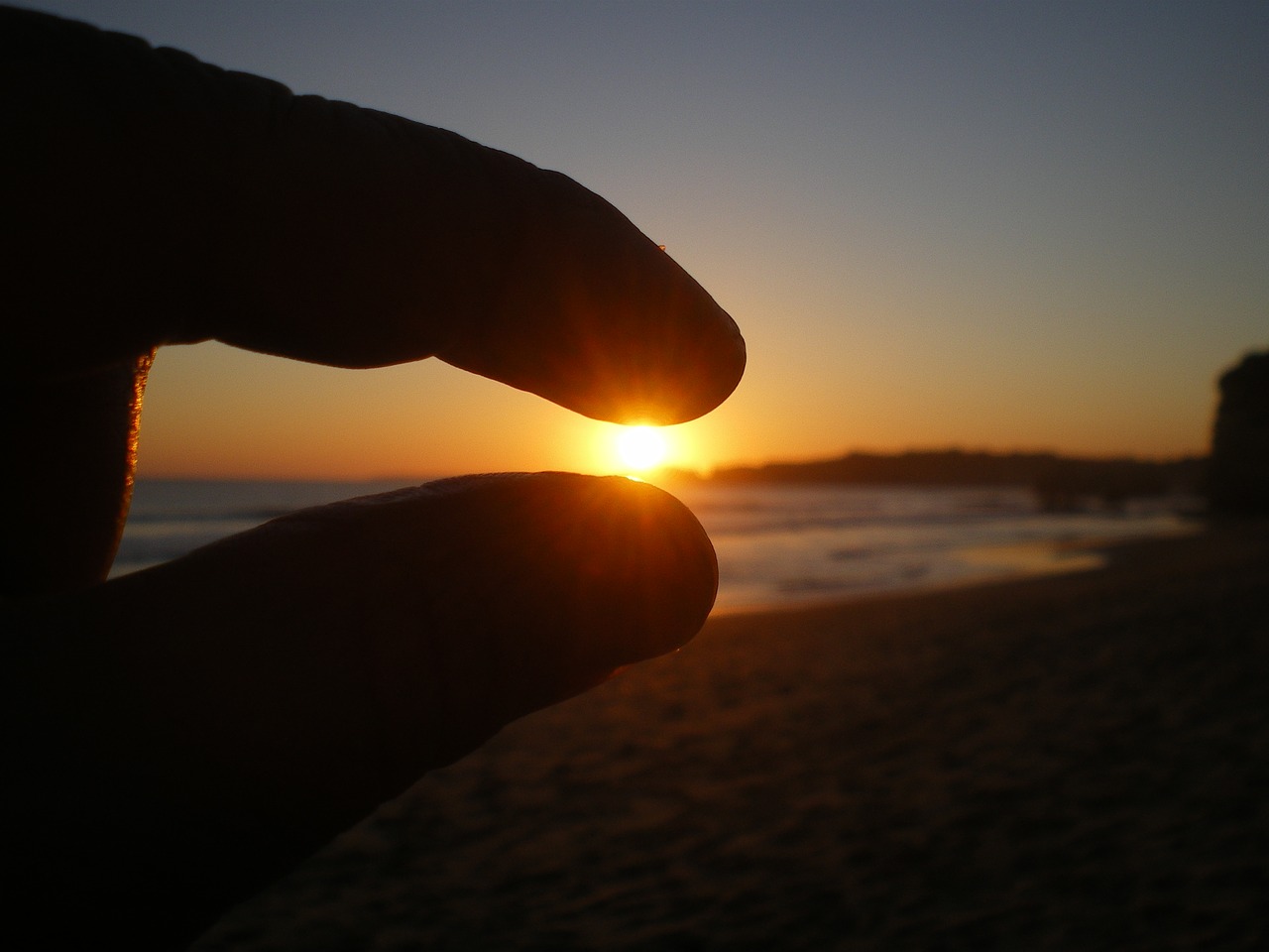 sun fingers sea free photo