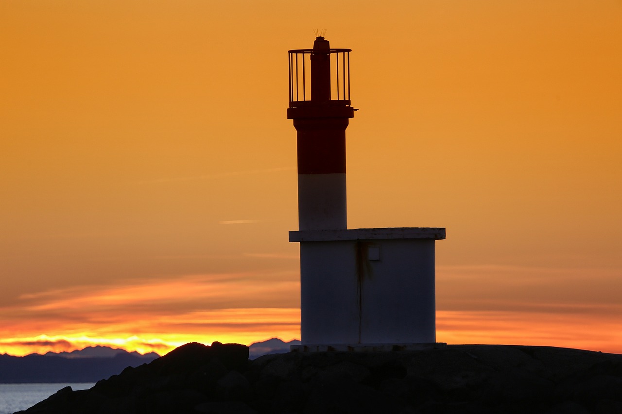 sun  lighthouse  sea free photo