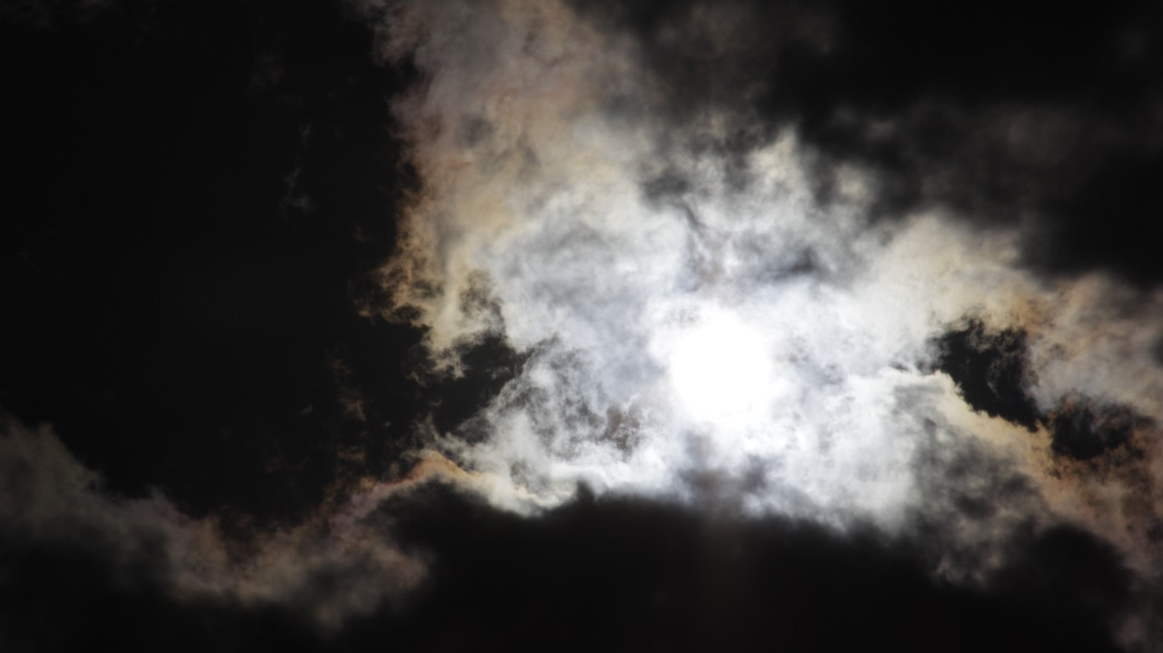 sun black clouds lights free photo