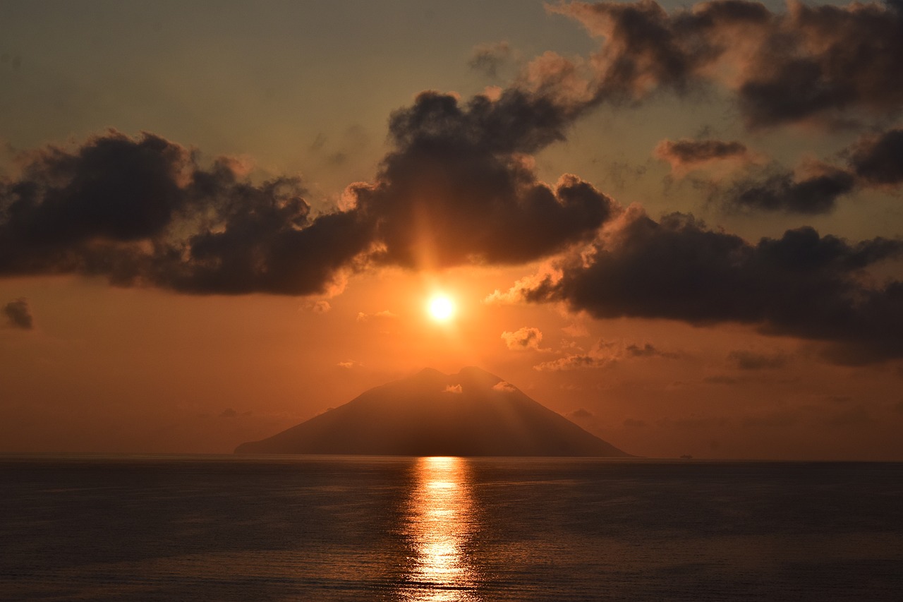 sun cloud sea stromboli volcano sunset dawn free photo
