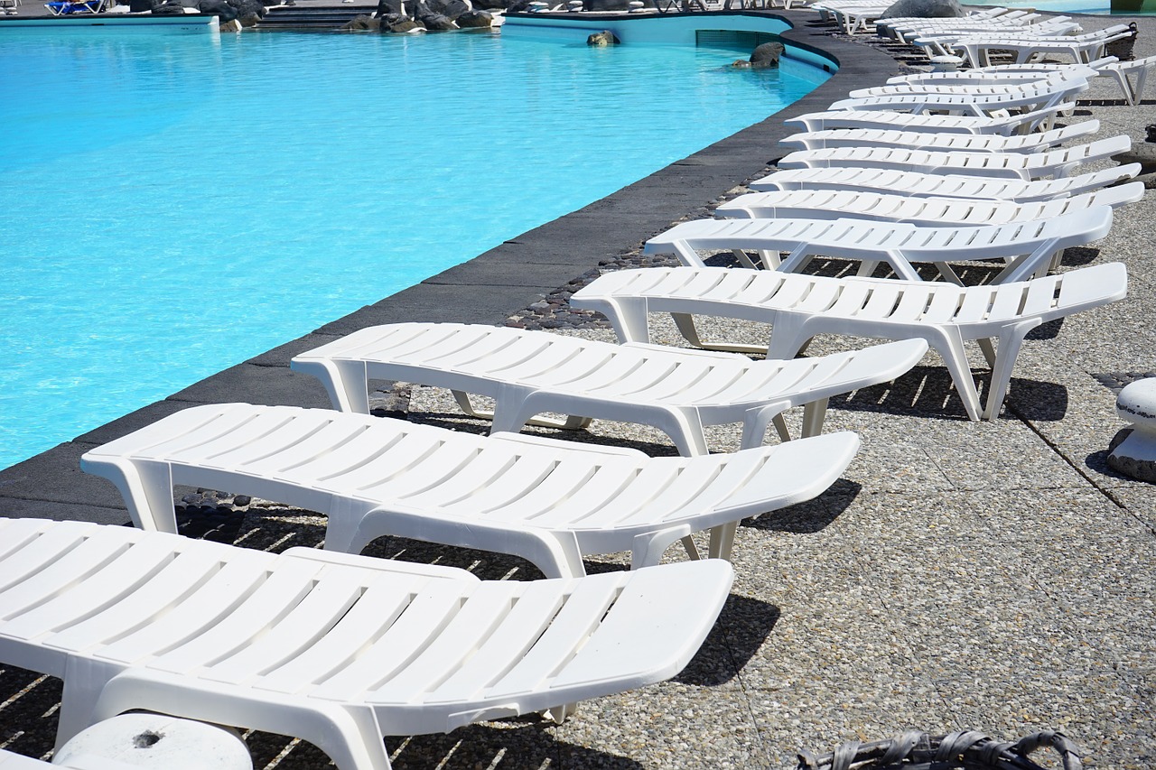sun loungers swimming pool pool free photo