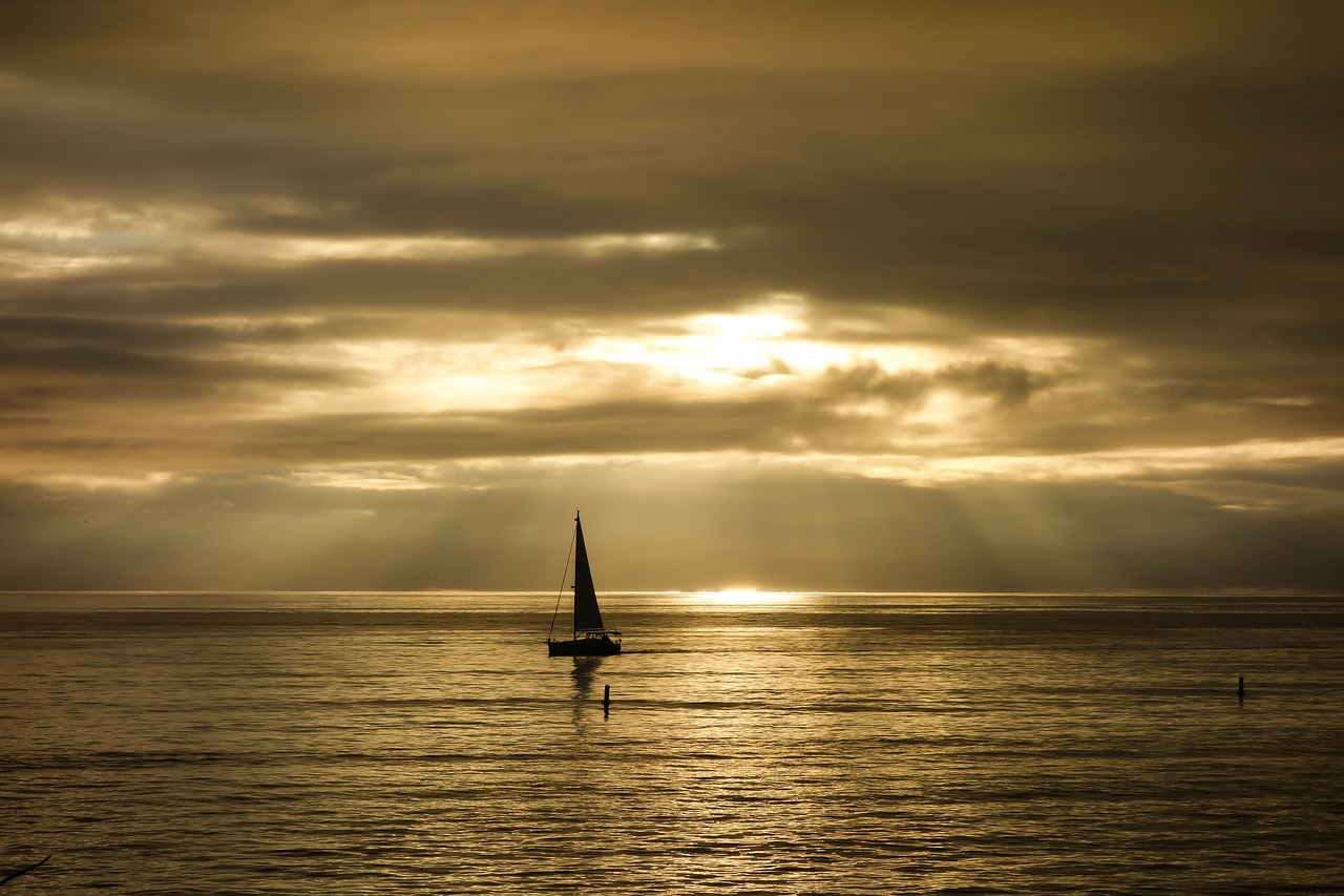 sunbeam  rays  boat free photo