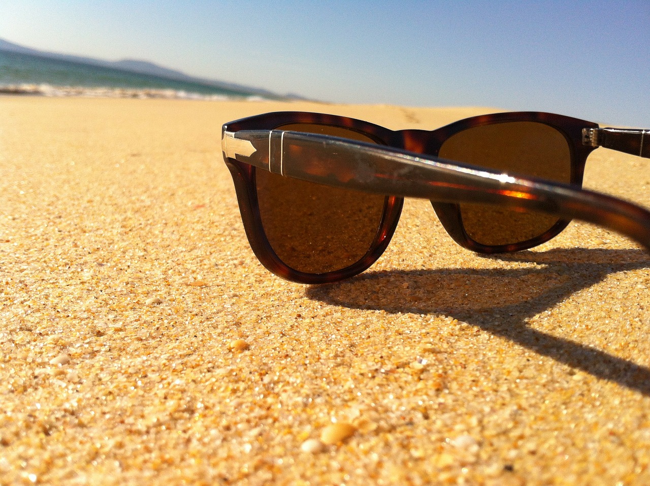 sunglasses sand sun free photo