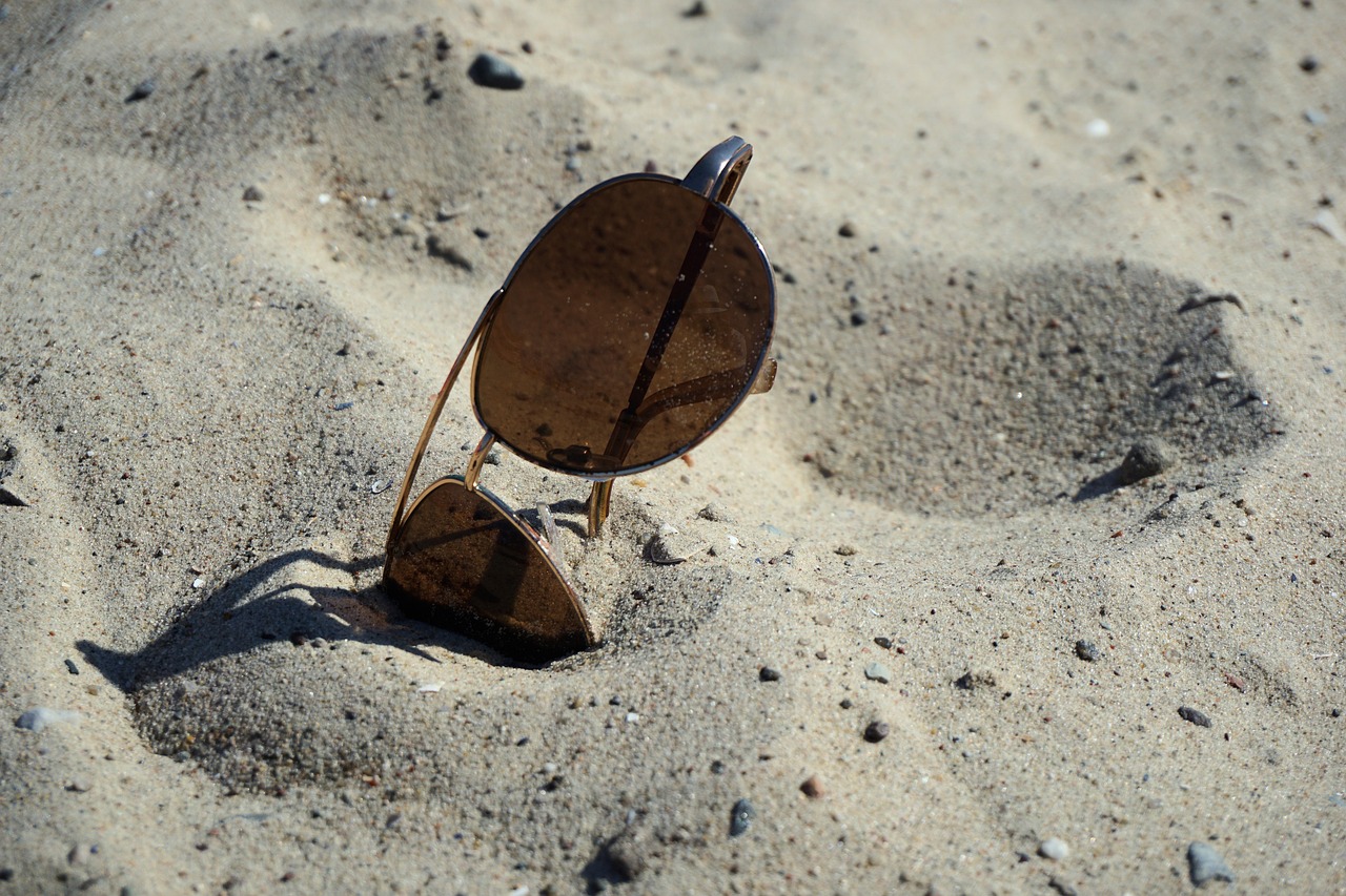 sunglasses beach sand free photo