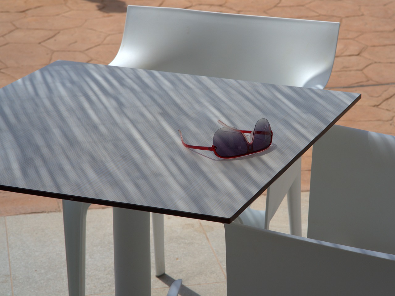 sunglasses  table  shadow free photo