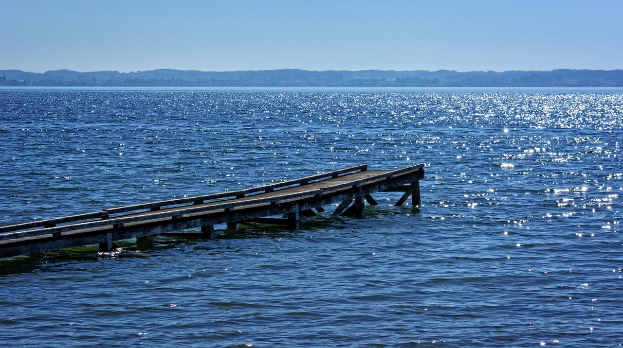 sunlight mirroring water free photo