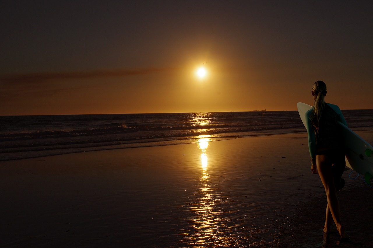 sunrise women's beach free photo