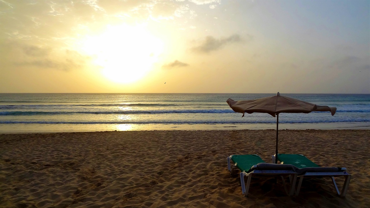 sunrise beach sun loungers free photo