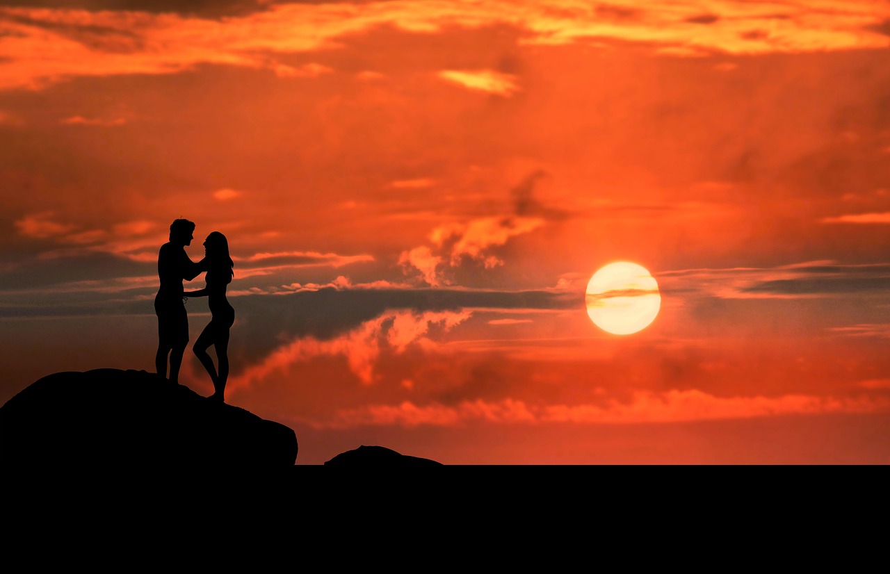 sunrise  couple  silhouette free photo