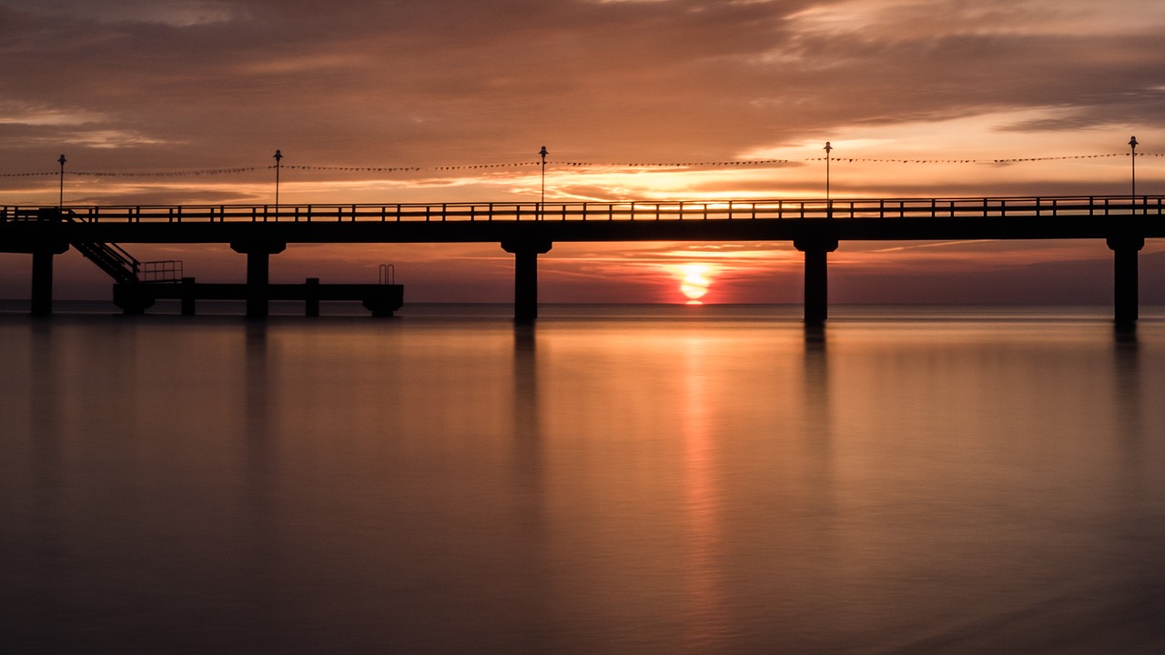 sunrise  beach  baltic sea free photo