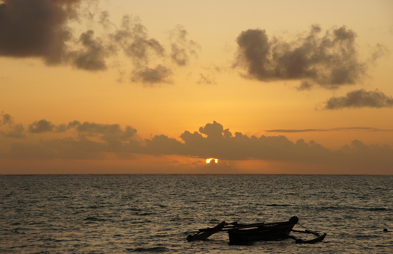 sunrise  zanzibar  sea free photo