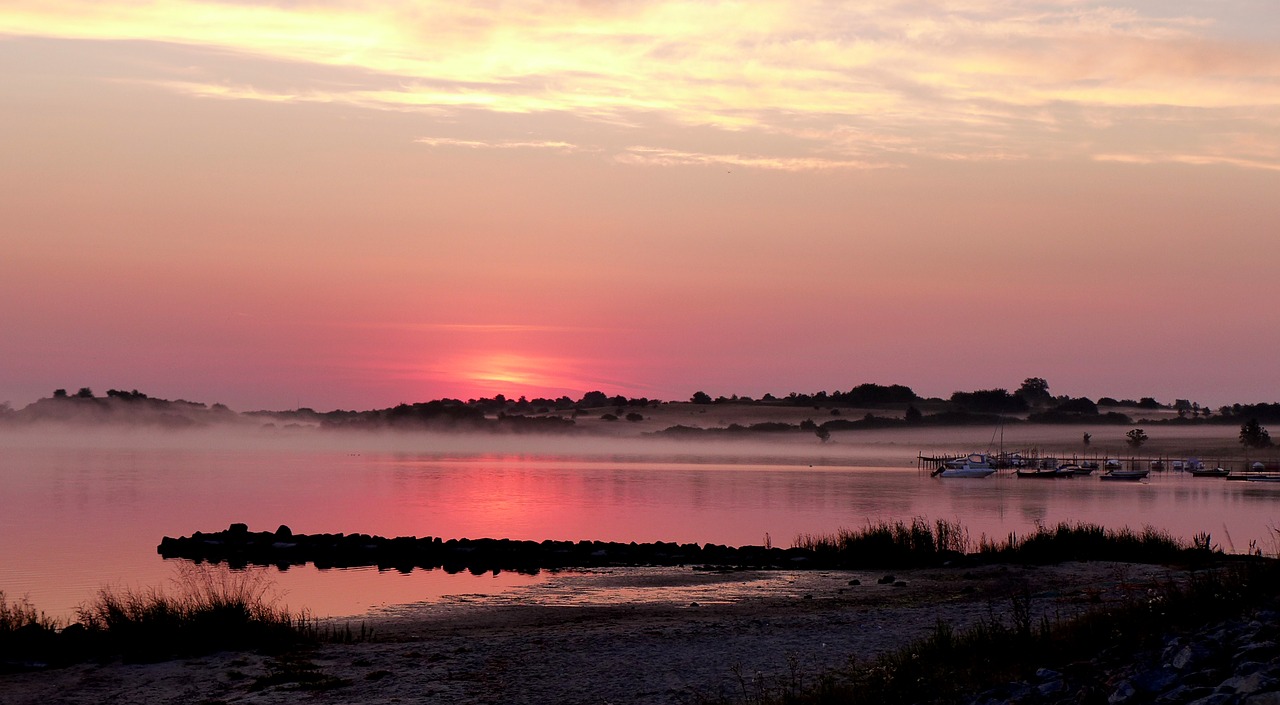 sunrise  bodden  water free photo