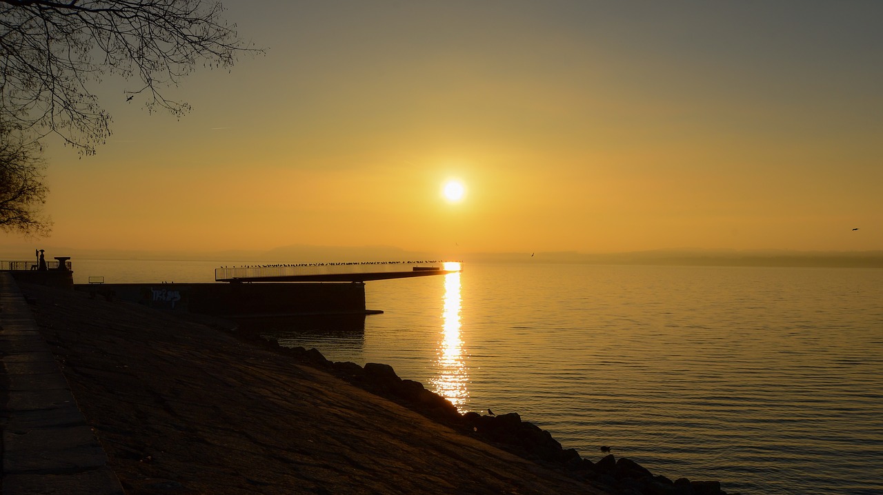 sunrise  lake  bridge free photo