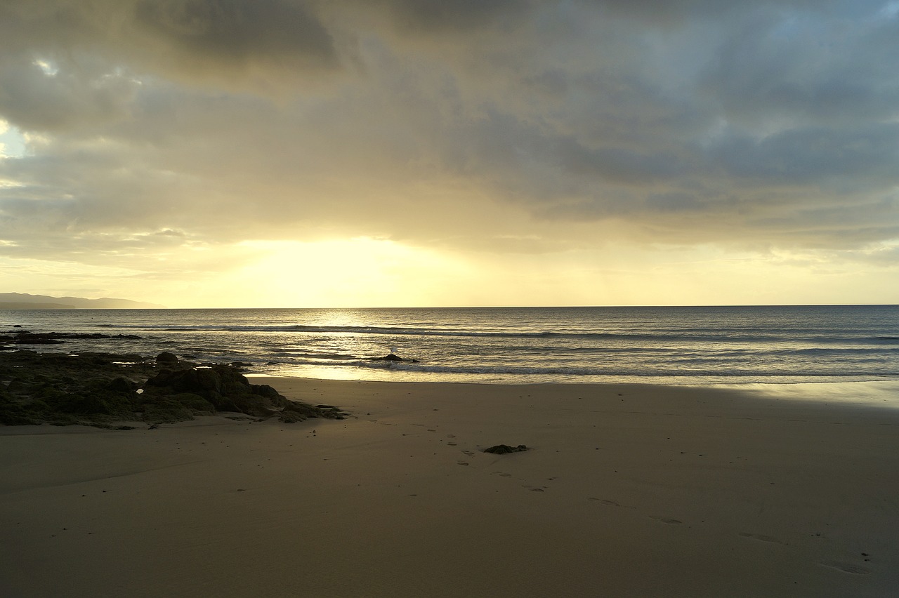 sunrise  clouds  beach free photo