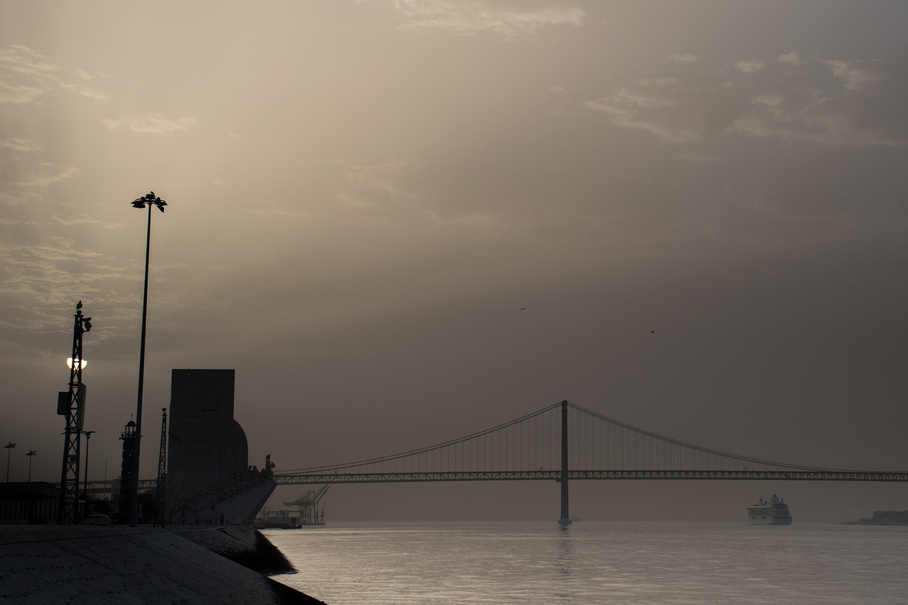 sunrise  bridge  water free photo