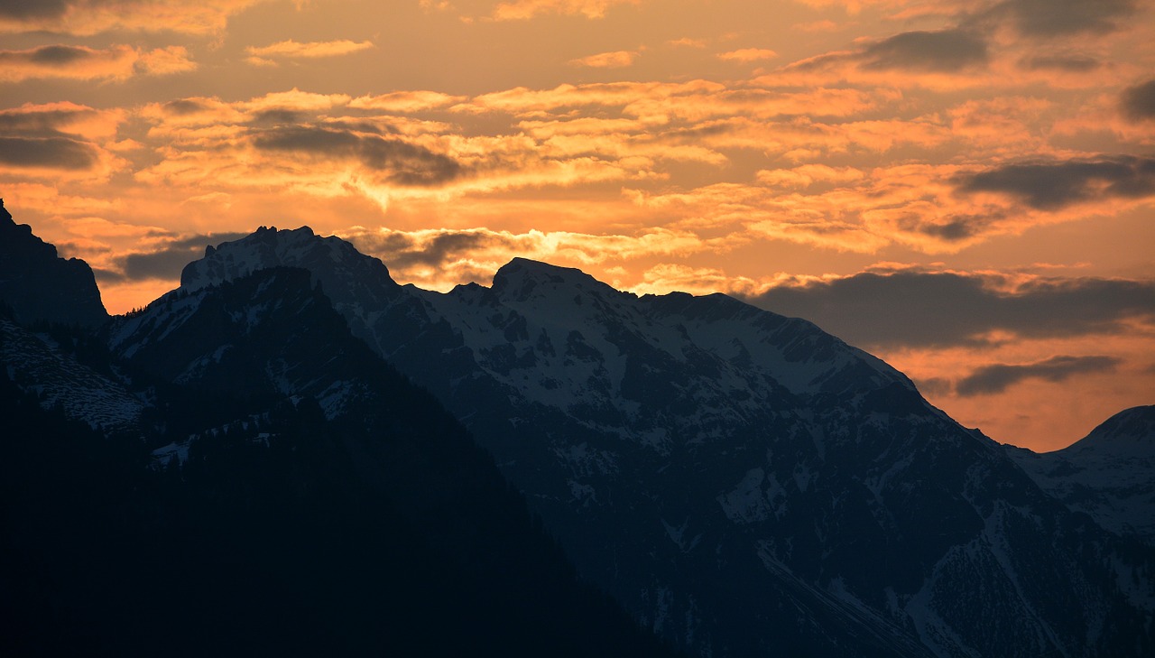 sunrise mountains mountain peaks free photo