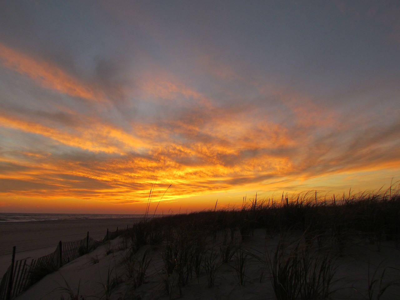 sunset beach clouds free photo