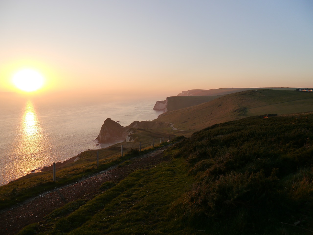 sunset mountains ocean free photo