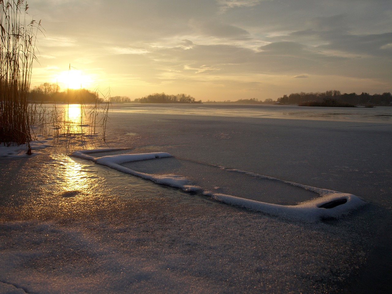 sunset frozen lake frozen boat free photo