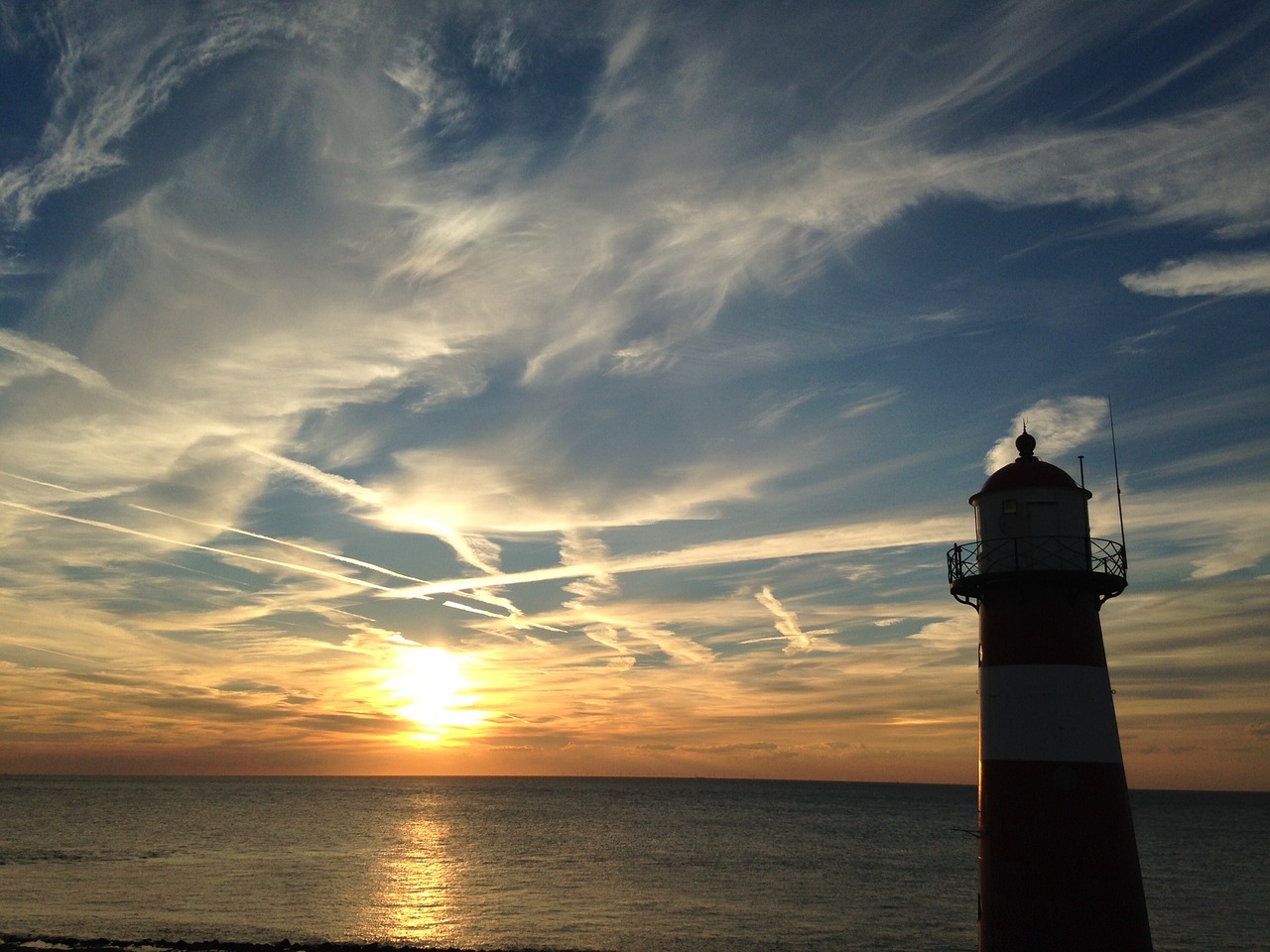 sunset in westkapelle nl lighthouse free photo