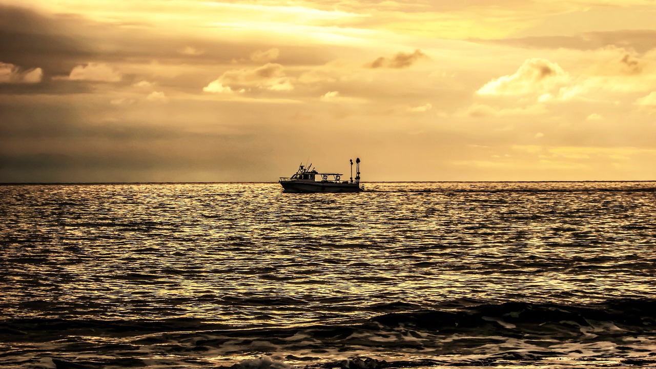 sunset boat sea free photo